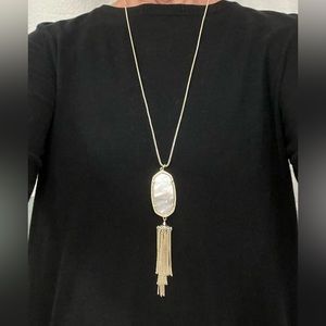 Kendra Scott gold with mother of pearl pendant with tassel. Excellent condition